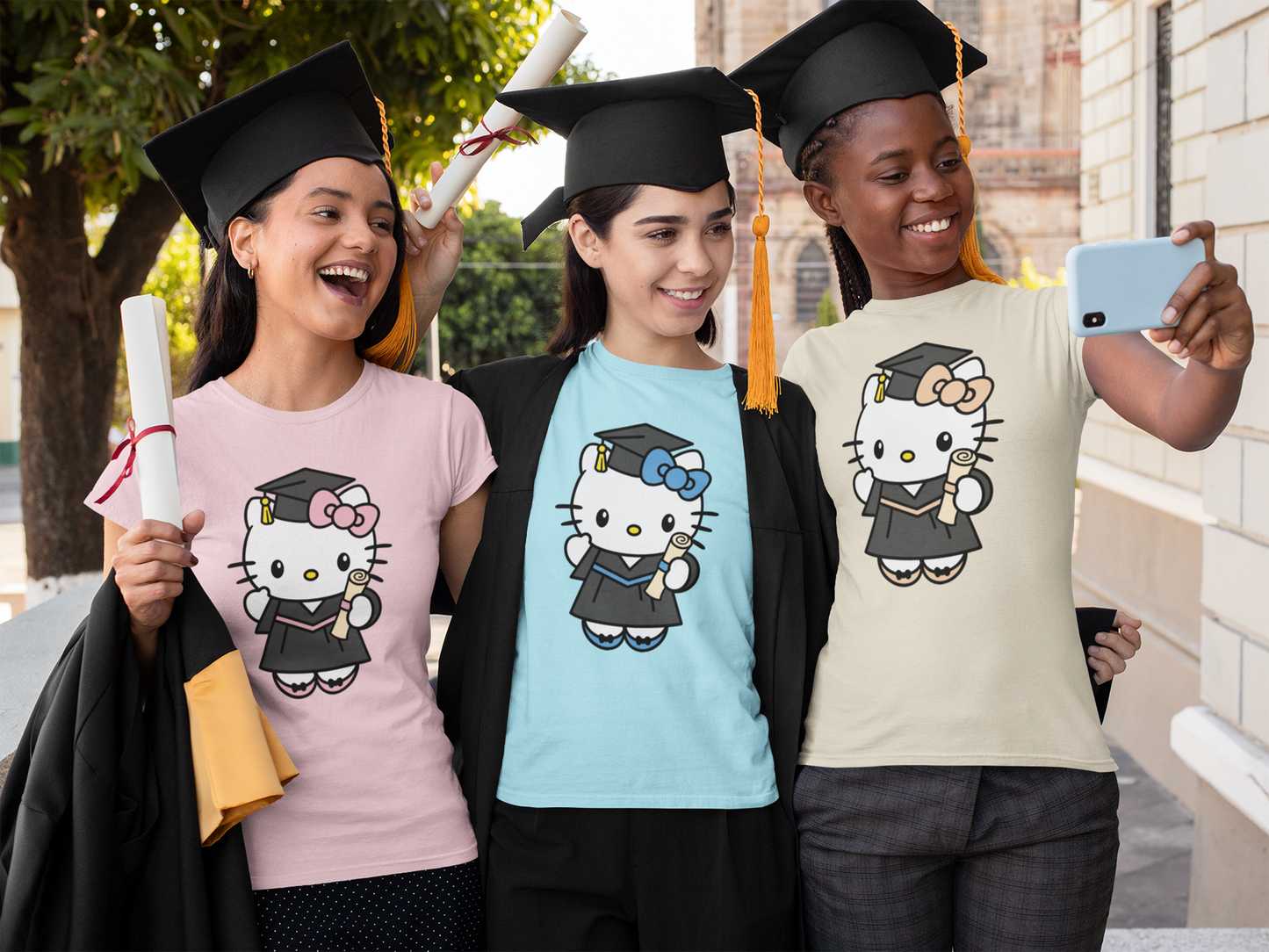 A set of Hello Kitty Graduate Clipart designs in 12 different colors. Each Hello Kitty is shown wearing a cap and gown, holding a diploma, ideal for graduation-themed projects.