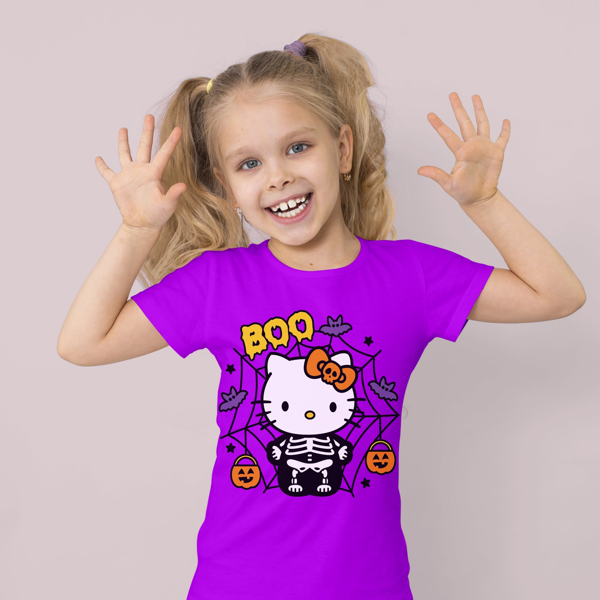 Hello Kitty dressed as a skeleton with a Halloween theme, including bats, pumpkins, and a spider web. High-resolution digital file in SVG, PNG, EPS, and DXF formats, perfect for Halloween crafts and DIY projects.